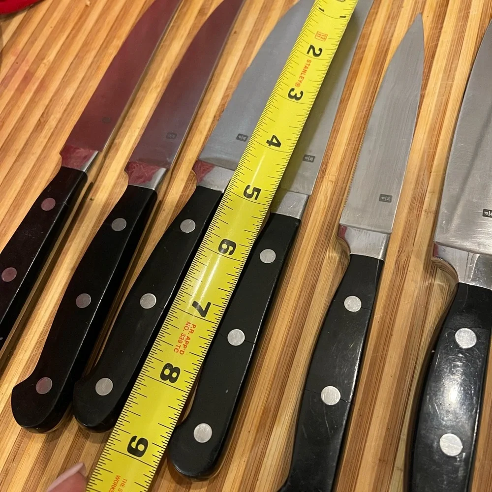 Set of Six Black Handle Wolfgang Puck Steak Knives